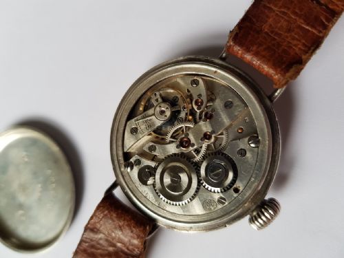 A FINE WW1 BLACK DIAL TRENCH WATCH IN A SILVER WATERPROOF DESIGN SCREW FRONT AND BACK CASE DATING TO 1917 - ADDITIONAL PHOTO 8
