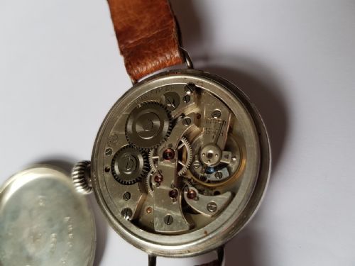 A FINE WW1 BLACK DIAL TRENCH WATCH IN A SILVER WATERPROOF DESIGN SCREW FRONT AND BACK CASE DATING TO 1917 - ADDITIONAL PHOTO 9