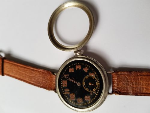 A FINE WW1 BLACK DIAL TRENCH WATCH IN A SILVER WATERPROOF DESIGN SCREW FRONT AND BACK CASE DATING TO 1917 - ADDITIONAL PHOTO 10