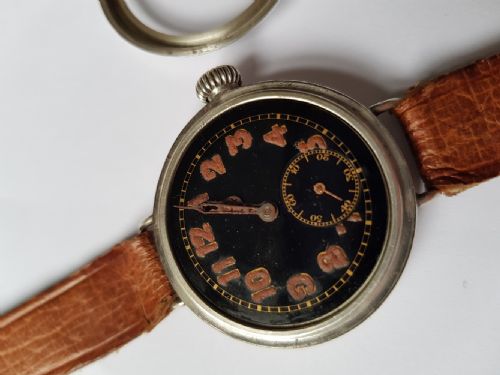 A FINE WW1 BLACK DIAL TRENCH WATCH IN A SILVER WATERPROOF DESIGN SCREW FRONT AND BACK CASE DATING TO 1917 - ADDITIONAL PHOTO 11