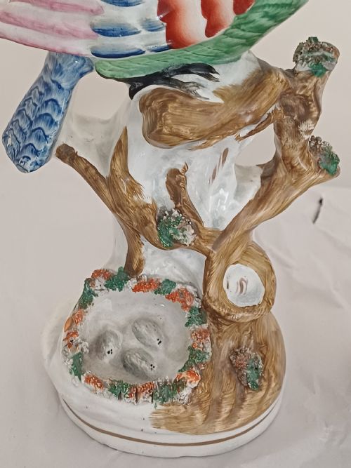 RESERVED AD A RARE PAIR OF STAFFORDSHIRE FIGURES OF A BIRD POSSIBLY A PIGEON OR DOVE SEATED ON A TREE WITH A NEST OF EGGS BELOW EACH ONE IS BRIGHTLY PAINTED AND DATING CIRCA 1860 - ADDITIONAL PHOTO 13