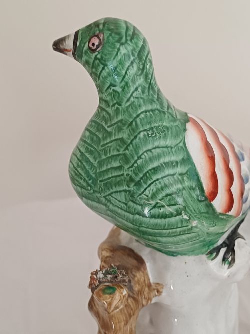 RESERVED AD A RARE PAIR OF STAFFORDSHIRE FIGURES OF A BIRD POSSIBLY A PIGEON OR DOVE SEATED ON A TREE WITH A NEST OF EGGS BELOW EACH ONE IS BRIGHTLY PAINTED AND DATING CIRCA 1860 - ADDITIONAL PHOTO 7