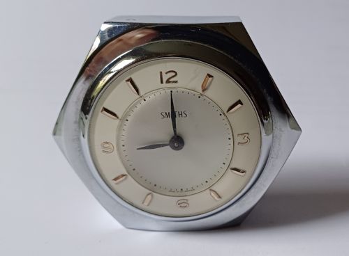 reserved ek a fantastic small smiths desk clock in the design of a motoring hexagonal wheel nut as designed for a set of sports car wire wheels dating circa 1940s - CATEGORY: ANTIQUE CLOCKS - DATED 1940