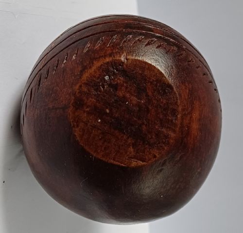 WOODEN SOLID WOOD CARVING OF A CRICKET BALL AS A DECK TOP ORNAMENT FOR THE MAN HAS EVERYTHING AND IS MAD ABOUT CRICKET PROBABLY MAHOGANY - ADDITIONAL PHOTO 7