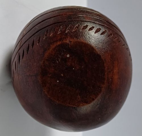 WOODEN SOLID WOOD CARVING OF A CRICKET BALL AS A DECK TOP ORNAMENT FOR THE MAN HAS EVERYTHING AND IS MAD ABOUT CRICKET PROBABLY MAHOGANY - ADDITIONAL PHOTO 8