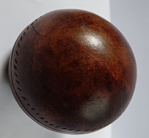 WOODEN SOLID WOOD CARVING OF A CRICKET BALL AS A DECK TOP ORNAMENT FOR THE MAN HAS EVERYTHING AND IS MAD ABOUT CRICKET PROBABLY MAHOGANY - ADDITIONAL PHOTO 14