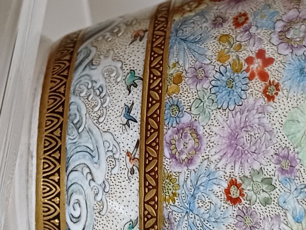 A Meiji period Satsuma earthenware vase featuring a thousand flowerhead pattern surrounding a reserve with figures in traditional Japanese dress. View XXI