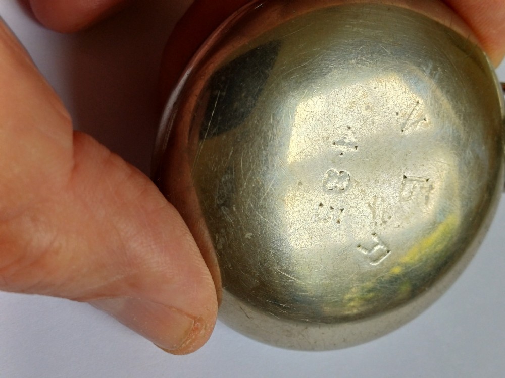 An open-face antique pocket watch featuring a white enamel dial with black Roman numerals, a sub-seconds dial, and a silver-tone nickel case. View VIII