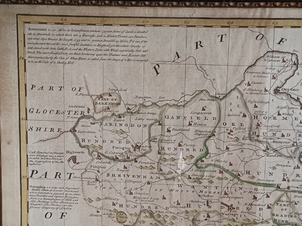 A framed 18th-century hand-coloured map of Berkshire by Emanuel Bowen featuring historical text cartouches and a dark wooden frame. View V