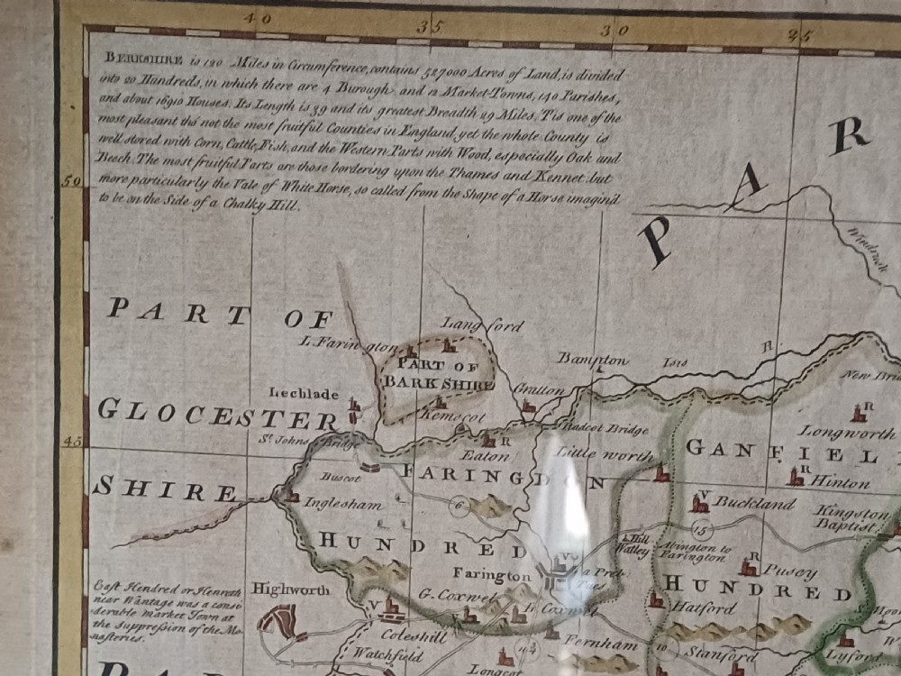 A framed 18th-century hand-coloured map of Berkshire by Emanuel Bowen featuring historical text cartouches and a dark wooden frame. View VII