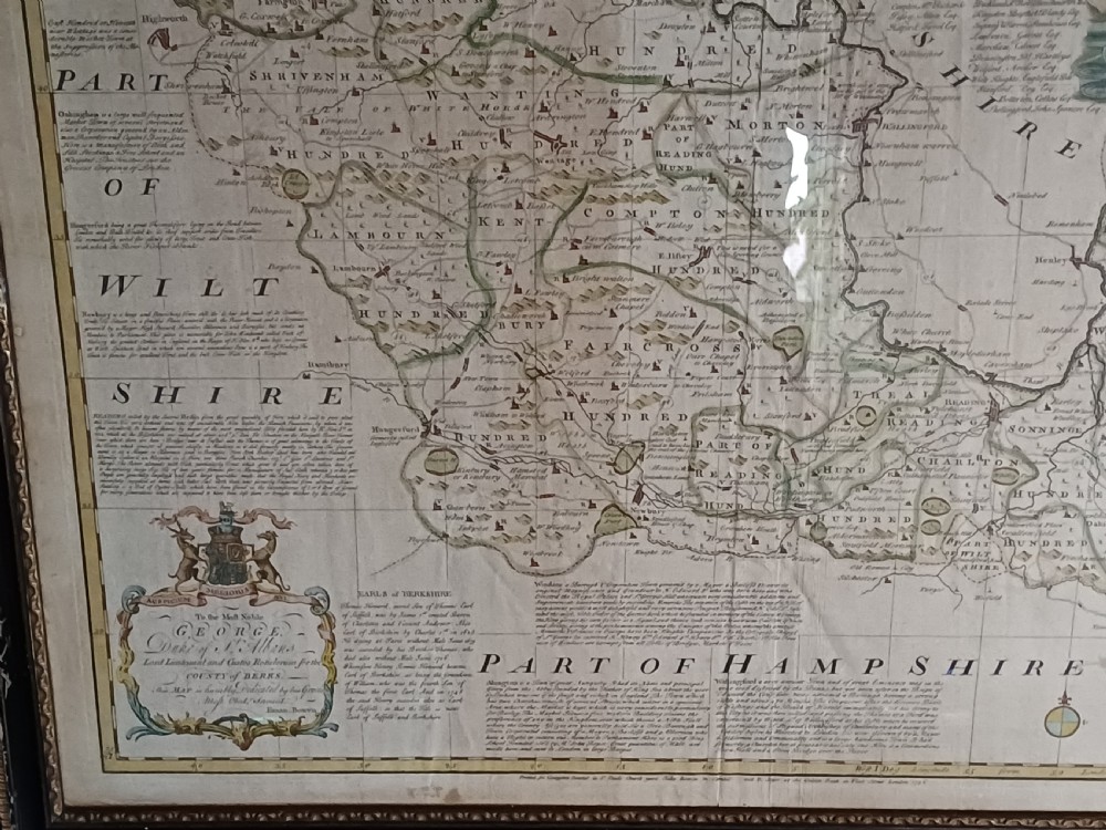 A framed 18th-century hand-coloured map of Berkshire by Emanuel Bowen featuring historical text cartouches and a dark wooden frame. View IX