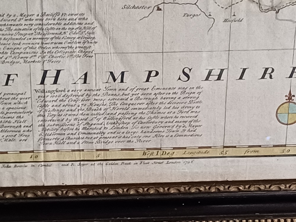 A framed 18th-century hand-coloured map of Berkshire by Emanuel Bowen featuring historical text cartouches and a dark wooden frame. View XIII