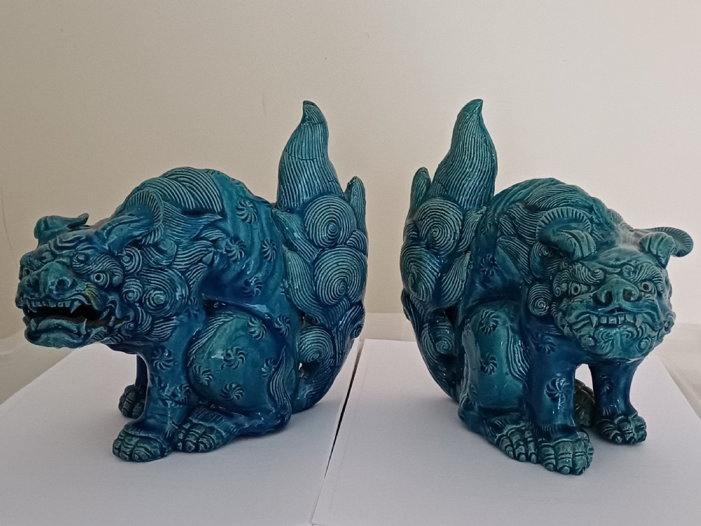 (Reserved MC) For sale, a fine pair of Japanese turquoise glazed Shi Shi dating to the Meiji period.