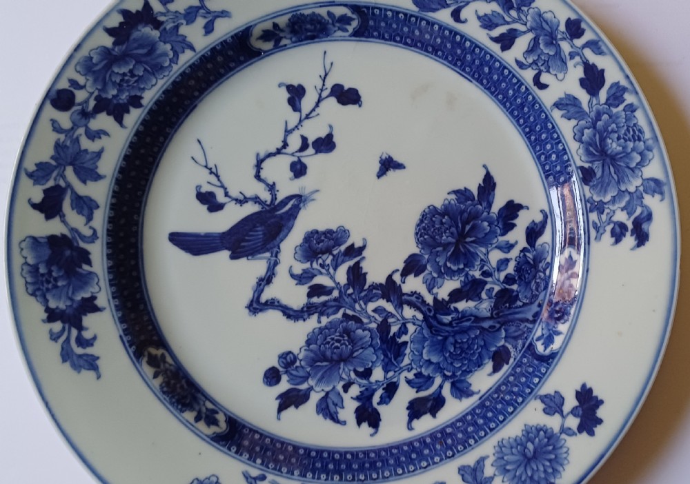 (Reserved PS) Chinese very finely painted blue and white plate decorated with a songbird and insects to the centre. Dating circa 1765.  View II