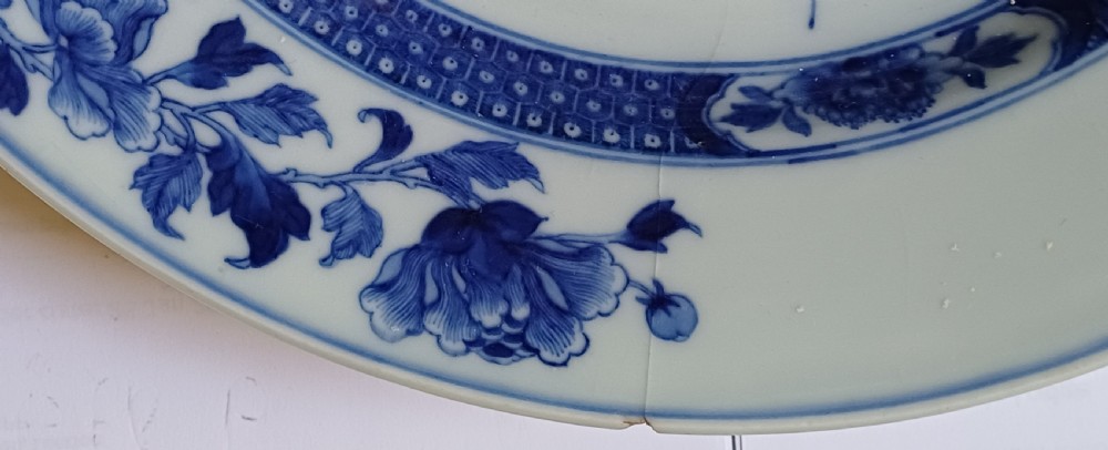(Reserved PS) Chinese very finely painted blue and white plate decorated with a songbird and insects to the centre. Dating circa 1765.  View III