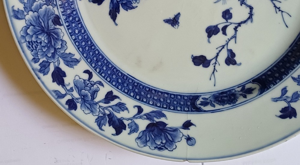 (Reserved PS) Chinese very finely painted blue and white plate decorated with a songbird and insects to the centre. Dating circa 1765.  View IV