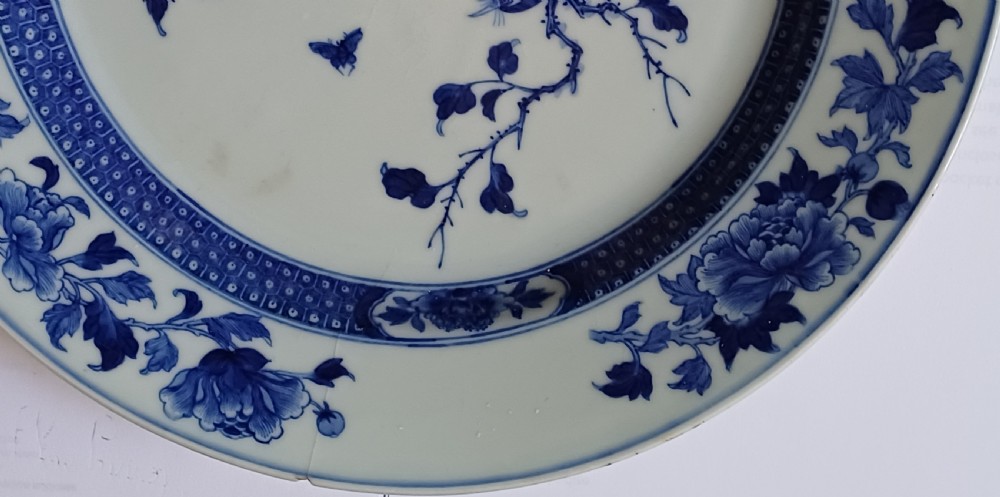 (Reserved PS) Chinese very finely painted blue and white plate decorated with a songbird and insects to the centre. Dating circa 1765.  View V