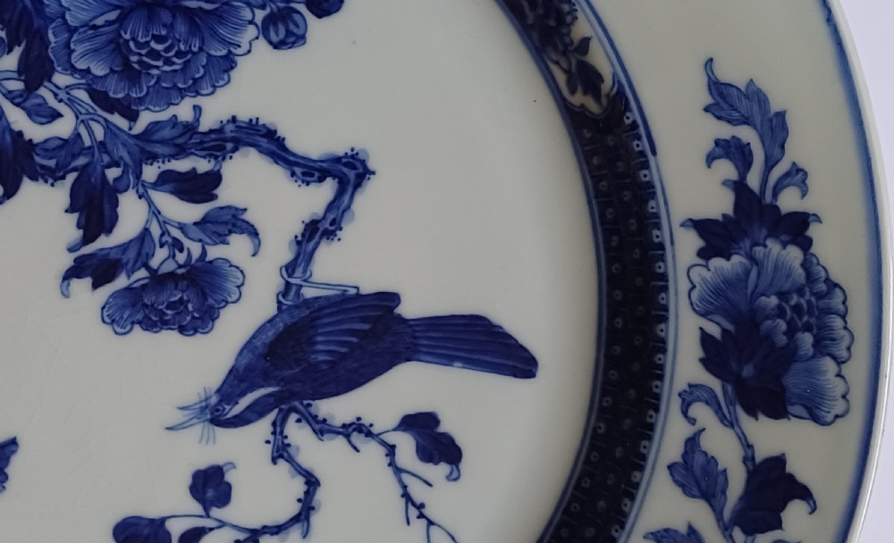 (Reserved PS) Chinese very finely painted blue and white plate decorated with a songbird and insects to the centre. Dating circa 1765.  View X