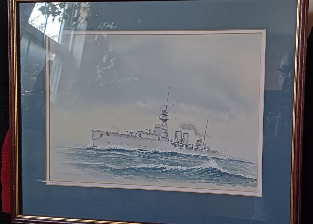 A framed watercolour painting depicting the Royal Navy warship HMS Dauntless sailing across ocean waves.