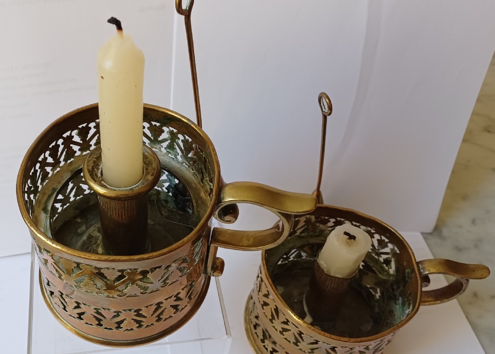 A pair of 19th-century English antique brass galleried candlesticks View VIII