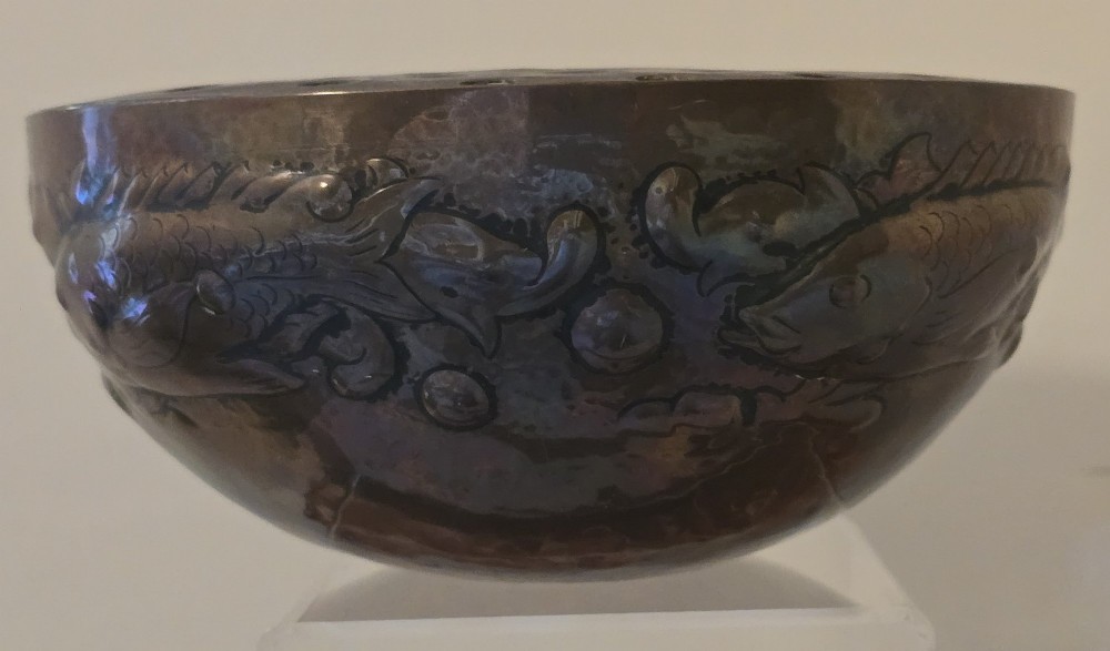 A hand-hammered dark copper rose bowl featuring embossed fish motifs and a pierced top lid. View XI