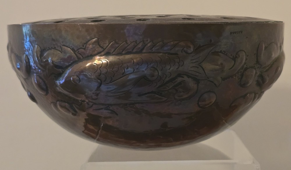 A hand-hammered dark copper rose bowl featuring embossed fish motifs and a pierced top lid. View XII