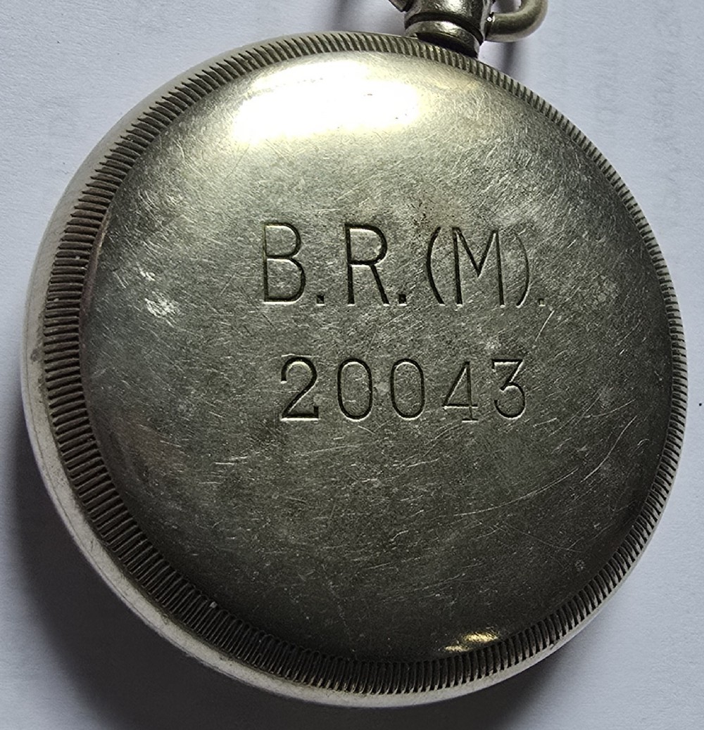 A British Rail Midland Region open-face pocket watch featuring a white dial with Roman numerals, spade hands, and a subsidiary seconds subdial. View VII