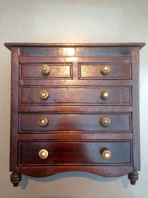 A Georgian Mahogany Mini Chest of Drawers