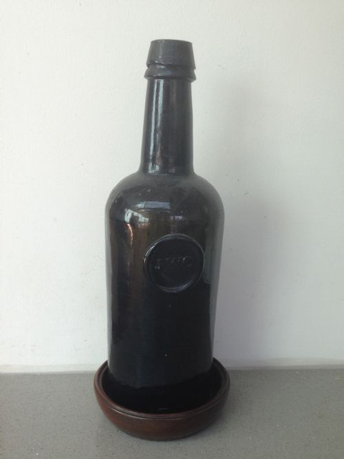 An Antique Mahogany Wine Coaster