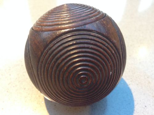 A 19th Century Lignum Vitae Puzzle Ball