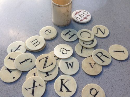 A 19th Century Ivory Alphabet Discs