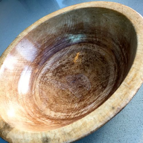 An Antique Fruit Wood Dairy Bowl