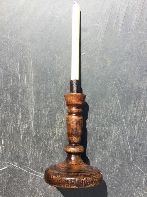 An Antique Sycamore Candle Stick