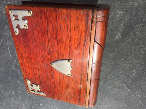 An Antique Money Box in the Form of a  Book