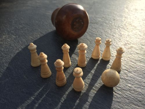 An Early 19th Century Coquille Nut Pear with Mini Bone Skittles