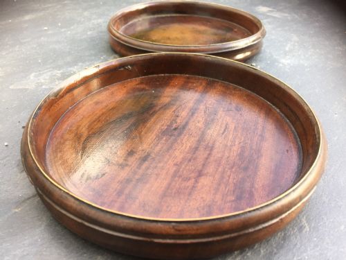 An 18th Century Pair of Mahogany & Brass Wine Coasters