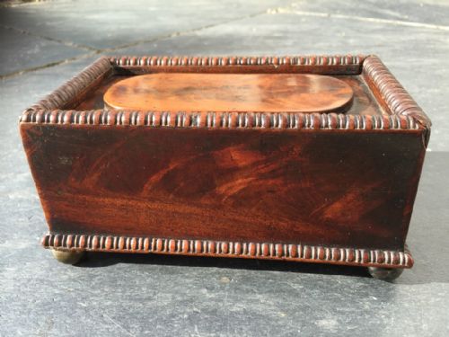 A Fine Regency Flame Mahogany Table Box