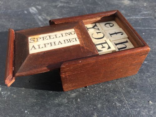 A Very Nice Victorian Treen Spelling/alphabet Set - With 55 Bone Letters