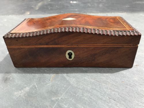 A Small Early to Mid 19th Century Flame Mahogany Box with Domed Lid