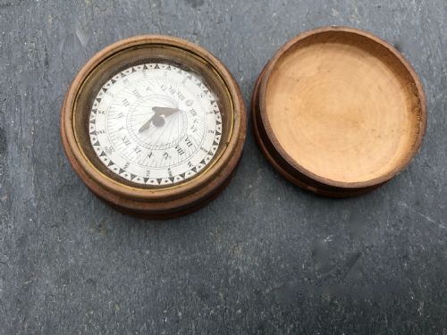 An Antique Sundial and Compass