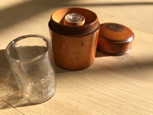 An Antique Apothecary Boxwood Holder - Two Glass Measuring Beakers - Treen