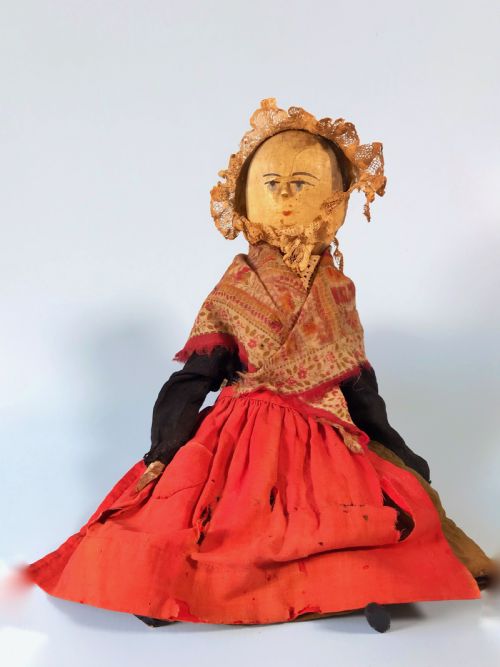 A Large Grodnertal Type Doll - In Old Clothes