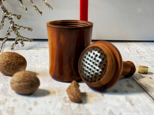fig 1. Antique Fruitwood Nutmeg Grater - wine bottle shape