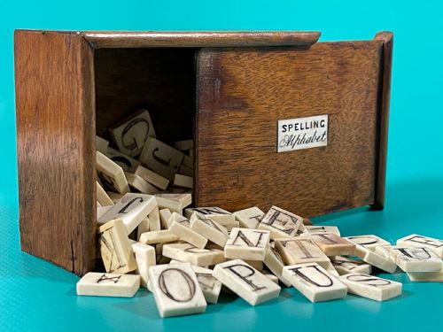 antique alphabet spelling box with 118 bone alphabet letters - CATEGORY: ANTIQUE MISCELLANEOUS - DATED 19TH CENTURY