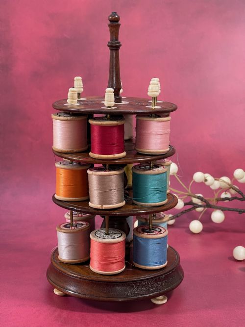 an early 800s mahogany reel stand includes 18 cotton reels - CATEGORY: ANTIQUE MISCELLANEOUS - DATED 19TH CENTURY