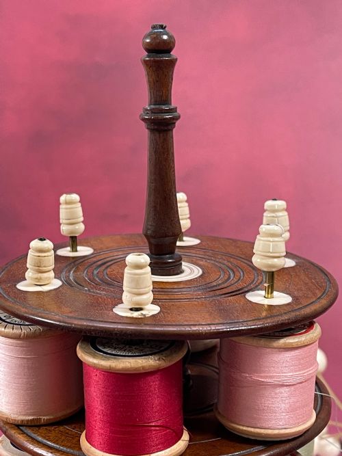 AN EARLY 800S MAHOGANY REEL STAND INCLUDES 18 COTTON REELS - ADDITIONAL PHOTO 4