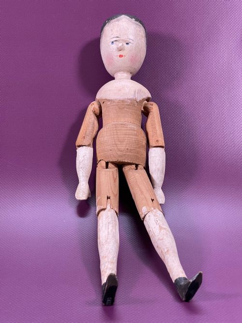 a large grodnertal wooden jointed doll - CATEGORY: ANTIQUE MISCELLANEOUS - DATED 1910