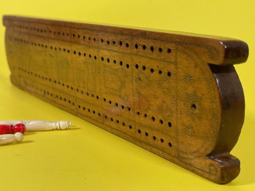 an unusual cribbage board with hearts clubs diamonds spades goblets jugs and dated - CATEGORY: ANTIQUE MISCELLANEOUS - DATED 19TH CENTURY