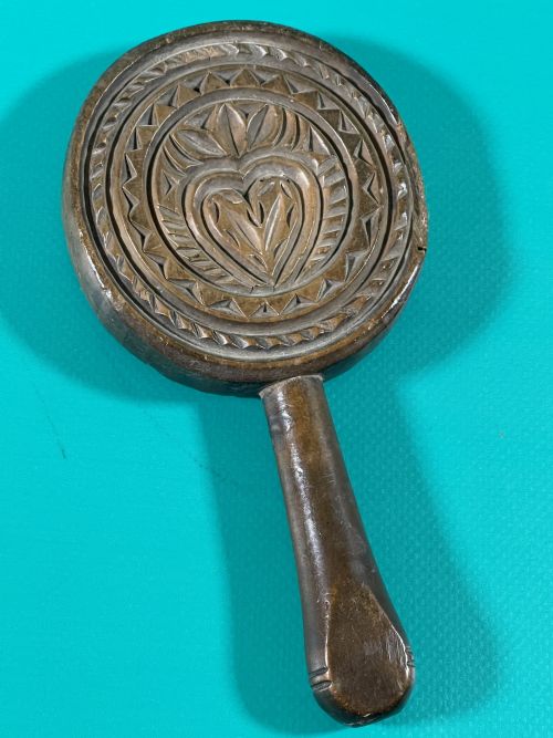 an antique treen lollipop butter stamp slapper - CATEGORY: ANTIQUE MISCELLANEOUS - DATED 19TH CENTURY