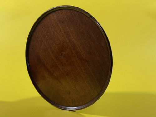 a small antique walnut circular tray - CATEGORY: ANTIQUE MISCELLANEOUS - DATED 19TH CENTURY